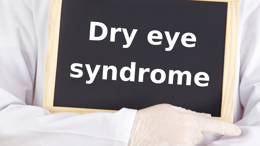 Doctor shows information: dry eye syndrome