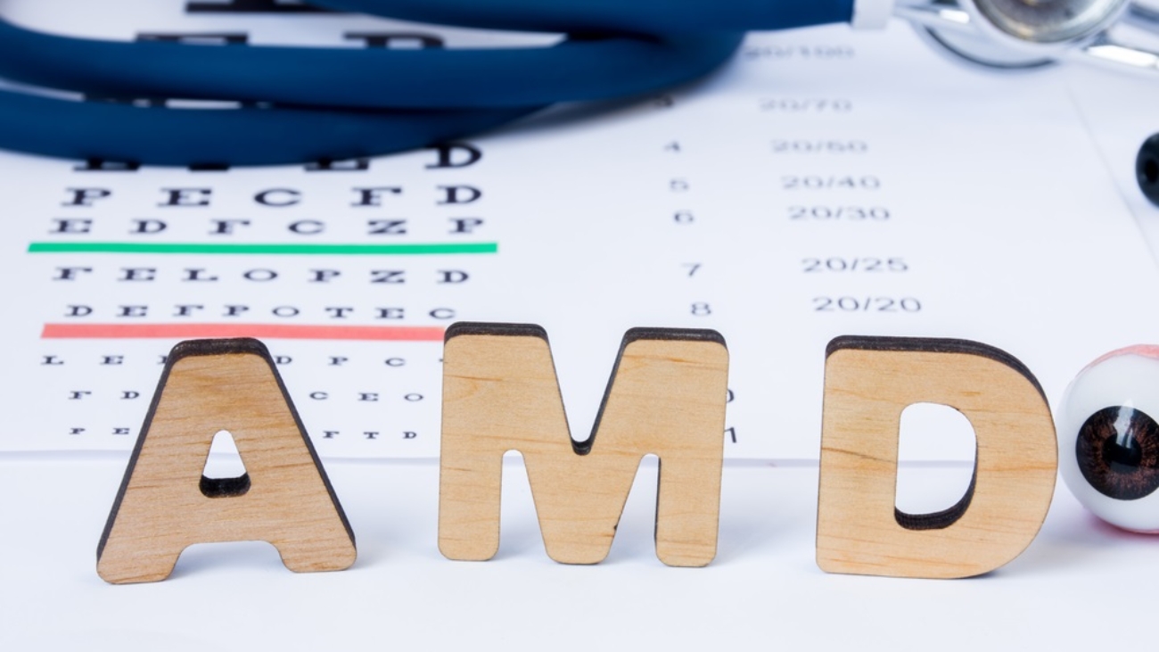 the letters AMD in front of an eye chart