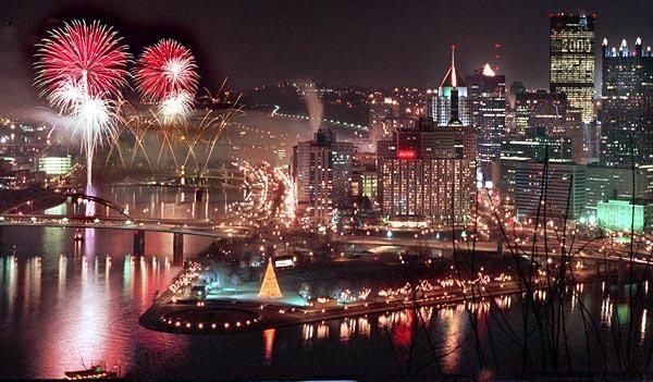 Fireworks over city of Pittsburgh at nighttime for a safe 4th of July celebration