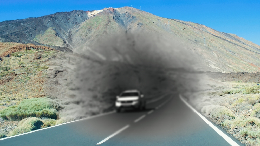 Vision Matters - car on highway with black-gray blur around it depicting low vision from macular degeneration.