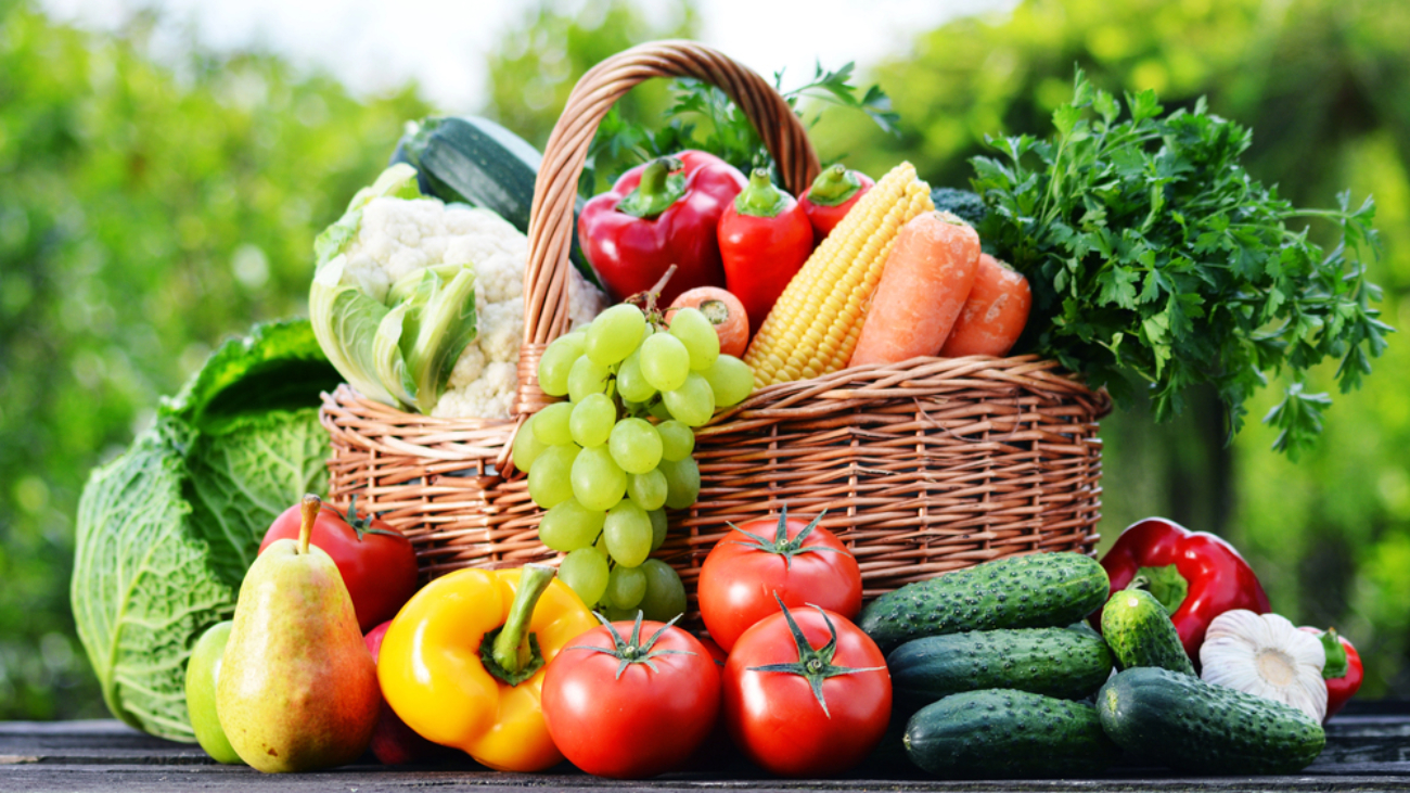 basket of fresh vegetables and fruit indicating Healthy Summer Vision