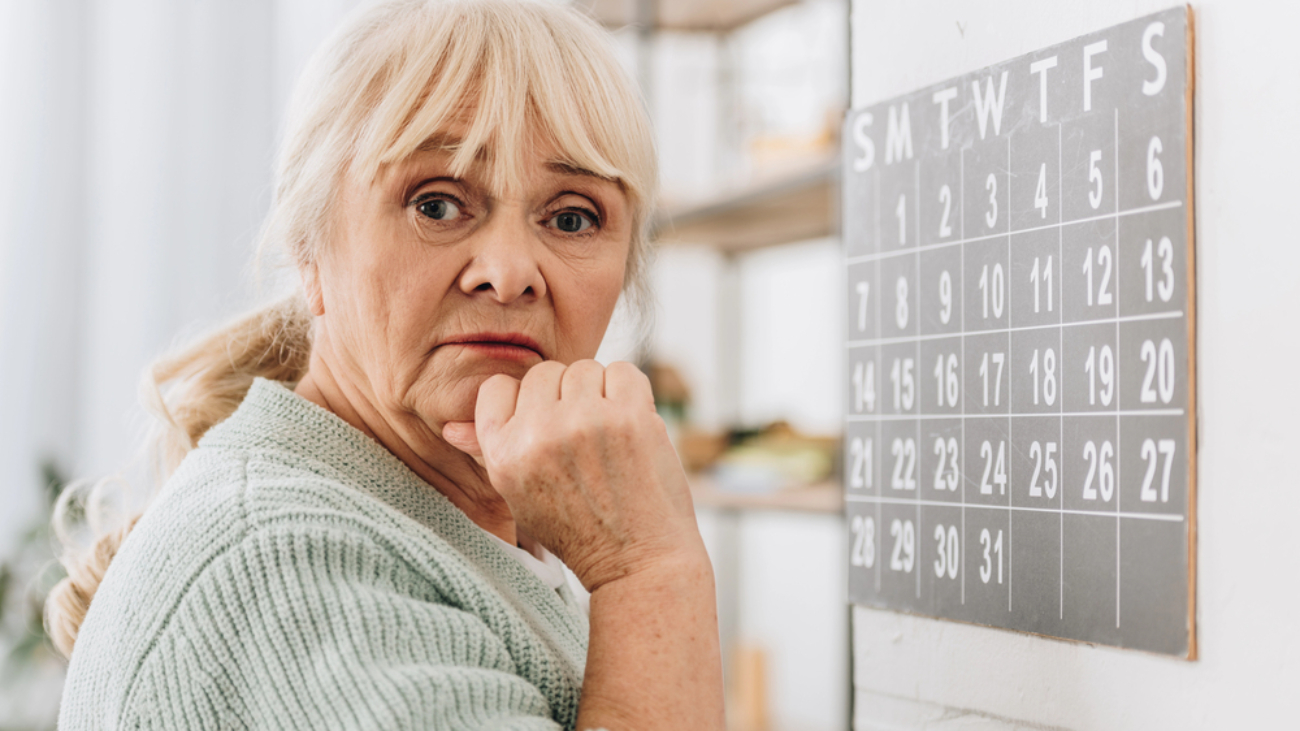 image of a senior age woman with her chin in her hand representing Low Vision After a Stroke